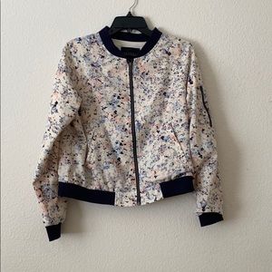 Splattered pattern zip up bomber jacket